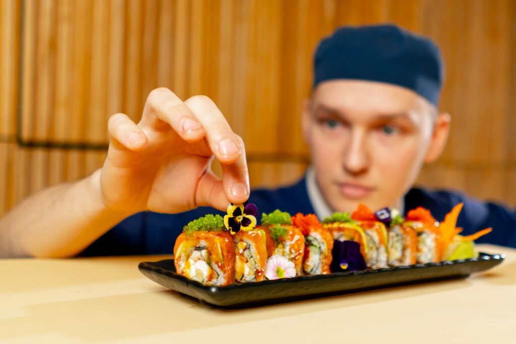 close-up-in-a-japanese-restaurant-a-chef-in-a-blue