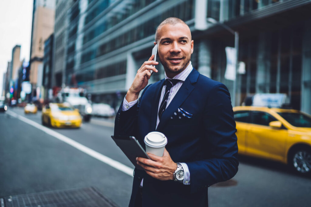 employer-in-official-clothes-answering-by-phone