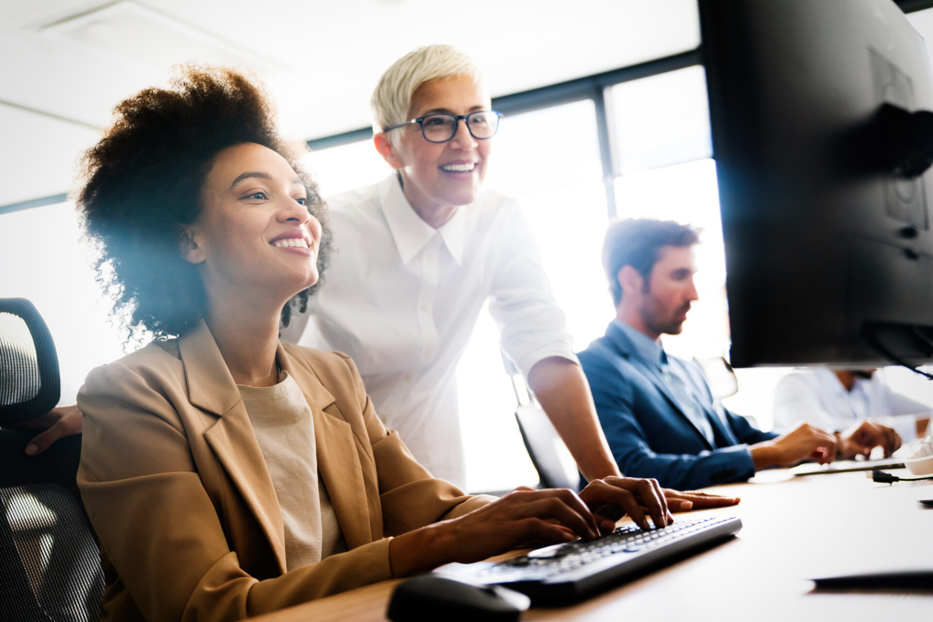 Portrait of successful business team working together in office
