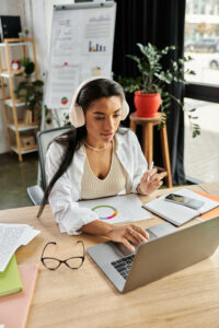 woman working from home using laptop on the table